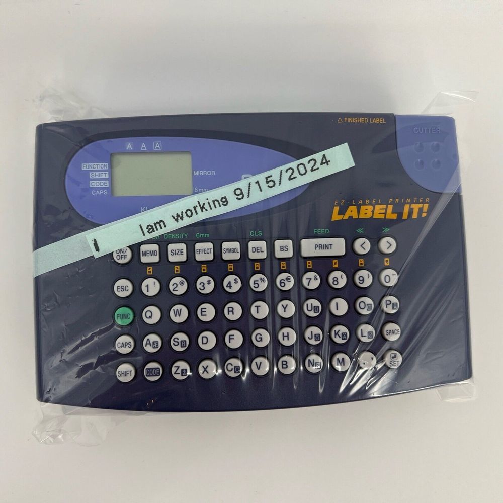 Casio LABEL IT! EZ-Label Printer Model # KL-60-L A Clear Tape Included Inside De